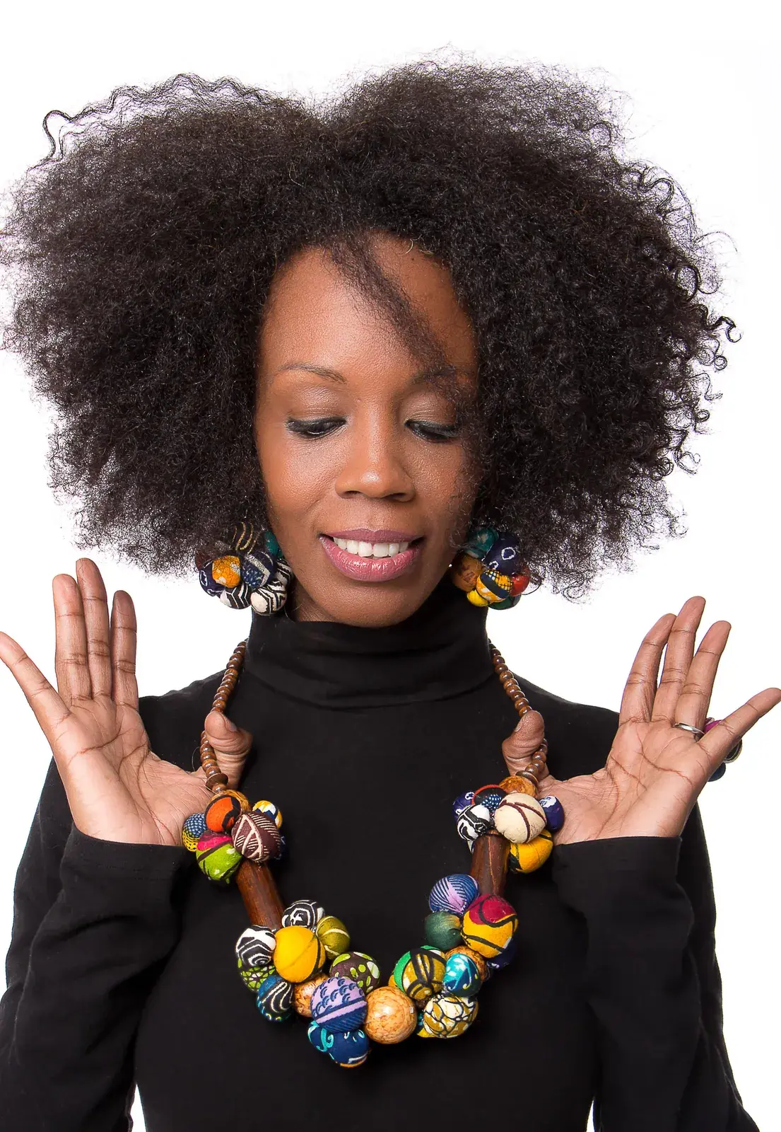 Photographie commerciale de bijoux artisanaux fond blanc